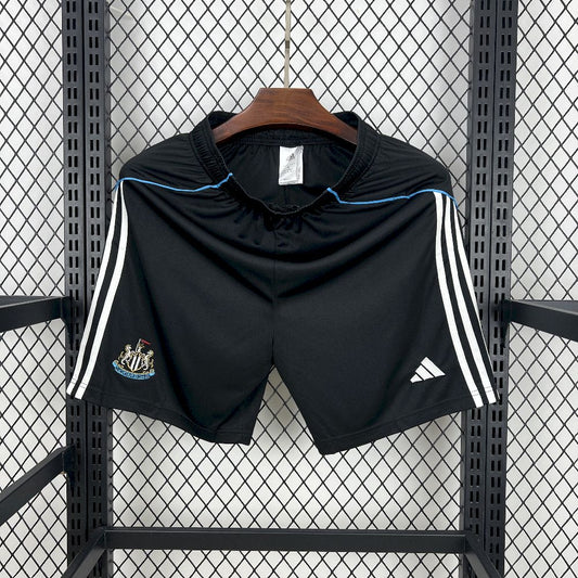 Calções Newcastle 2025-26 Principal
